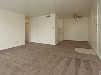Living room & dining area at The View At Catalina Apartments in Tucson, AZ